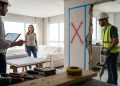 Quanto um pedreiro cobra para demolir uma parede e integrar sala e cozinha em um apartamento de 70 m² em 2026?