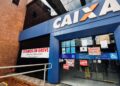 Greve na Caixa completa duas semanas, enquanto banco marca leilão com 67% de desconto